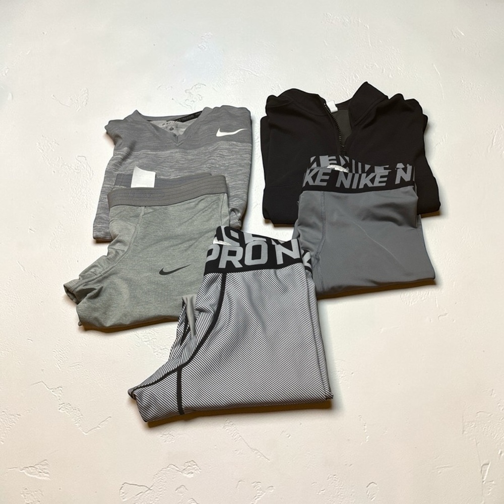 Nike Men’s Gray and Black Activewear Collection. This is a 5 piece set.